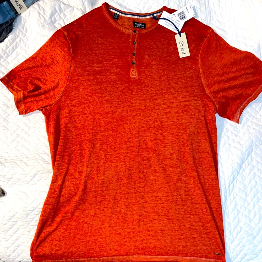 Bright orange t-shirt with metal buttons